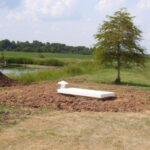 Installed storm shelter by a lake
